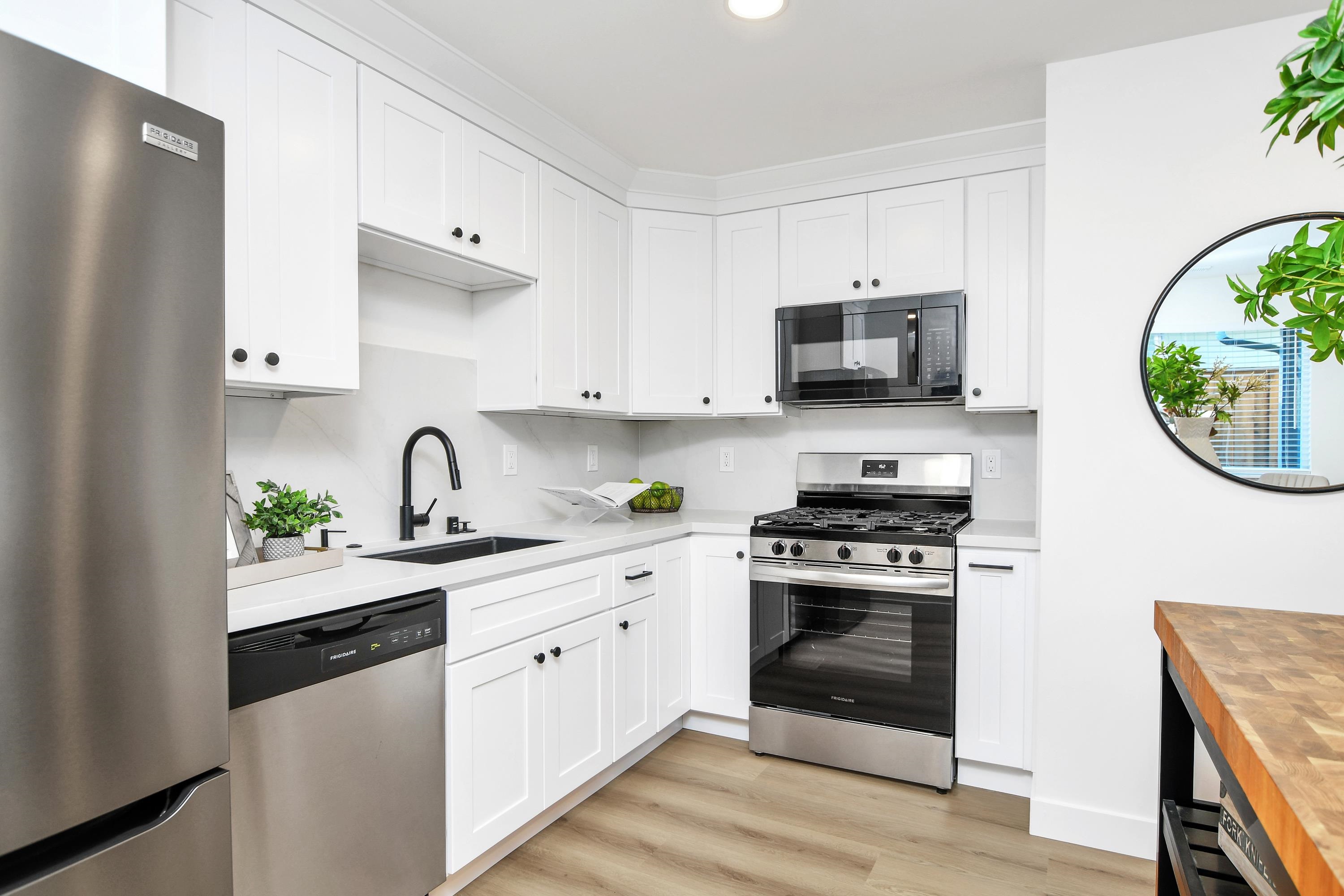 1351 Shell Avenue Martinez, CA 94553 - Photo 9 of 29 Kitchen featuring stainless steel appliances, white cabinetry, butcher block countertops, light wood-style flooring, and recessed lighting