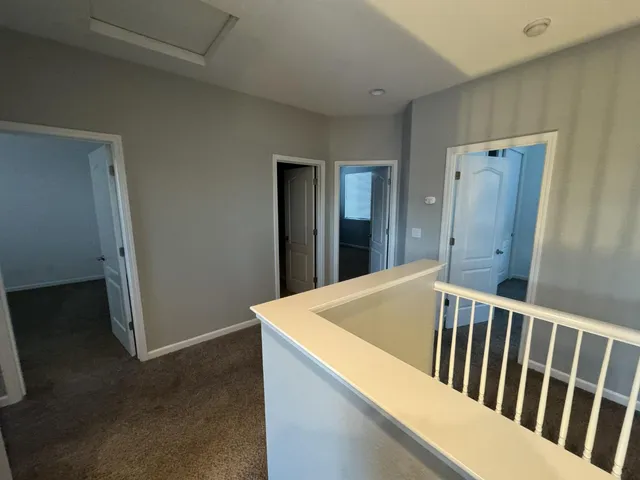a view of kitchen and wooden floor
