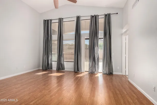 wooden floor and windows in a room