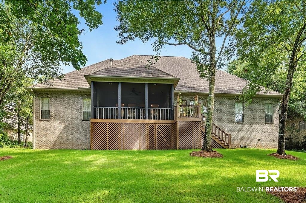 29976 Dolive Ridge Daphne, AL 36527 - Photo 6 of 58 Rear view of property with a sunroom and a lawn