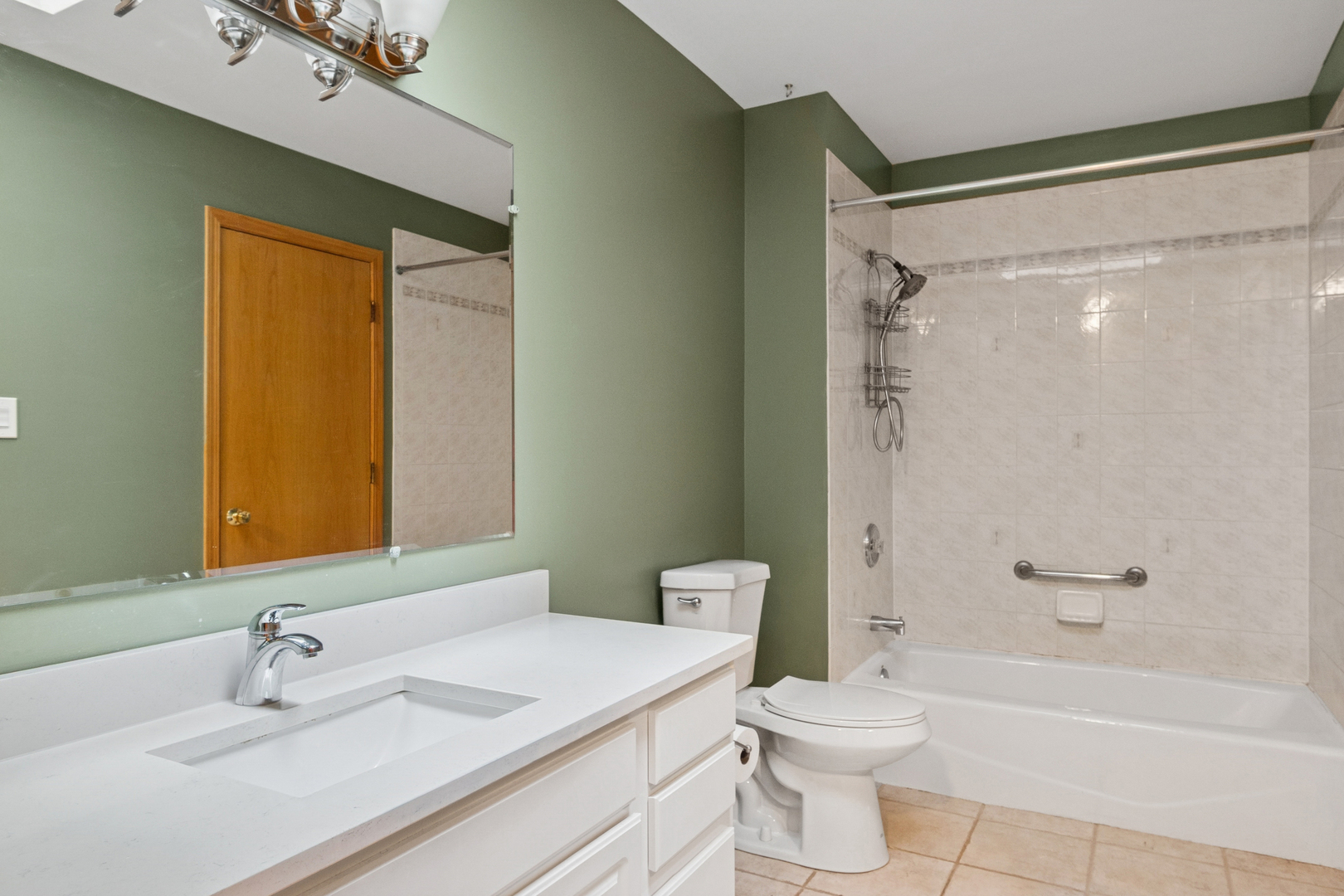 5356 Dixie Drive, Unit 5356 Alsip, IL 60803 - Photo 13 of 20 a bathroom with a sink toilet and shower