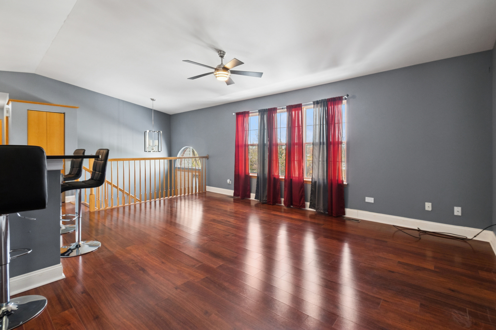 5356 Dixie Drive, Unit 5356 Alsip, IL 60803 - Photo 4 of 20 a view of an empty room with wooden floor and a window