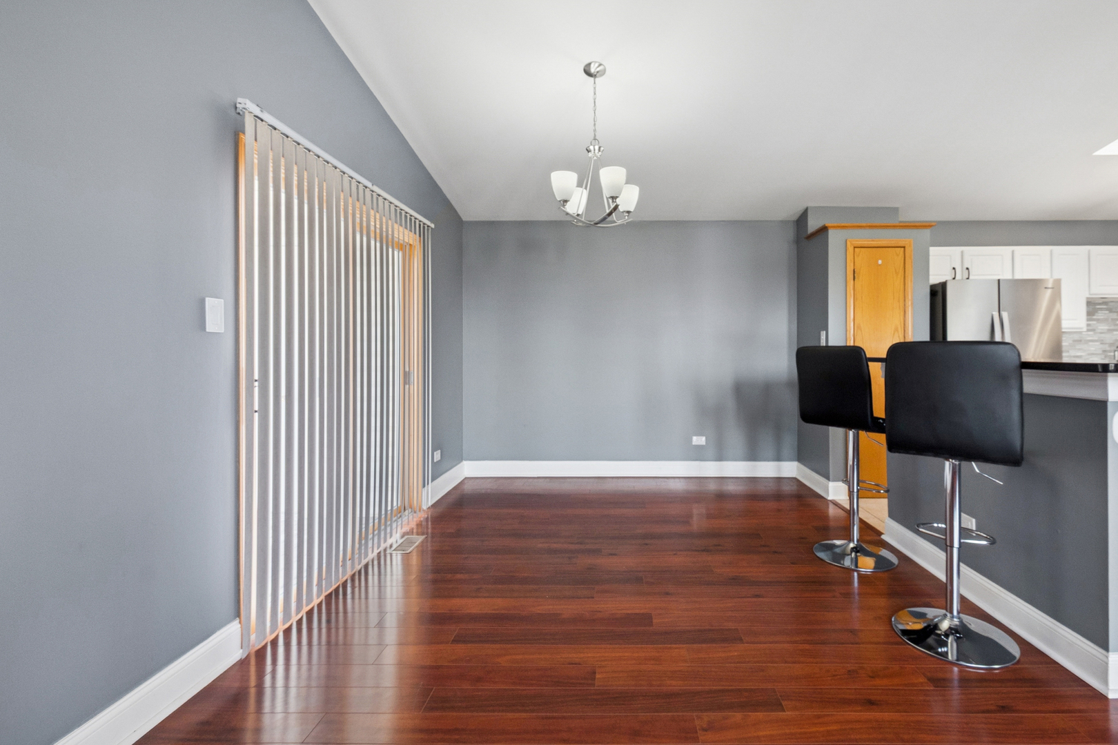 5356 Dixie Drive, Unit 5356 Alsip, IL 60803 - Photo 5 of 20 wooden floor in an empty room with a window