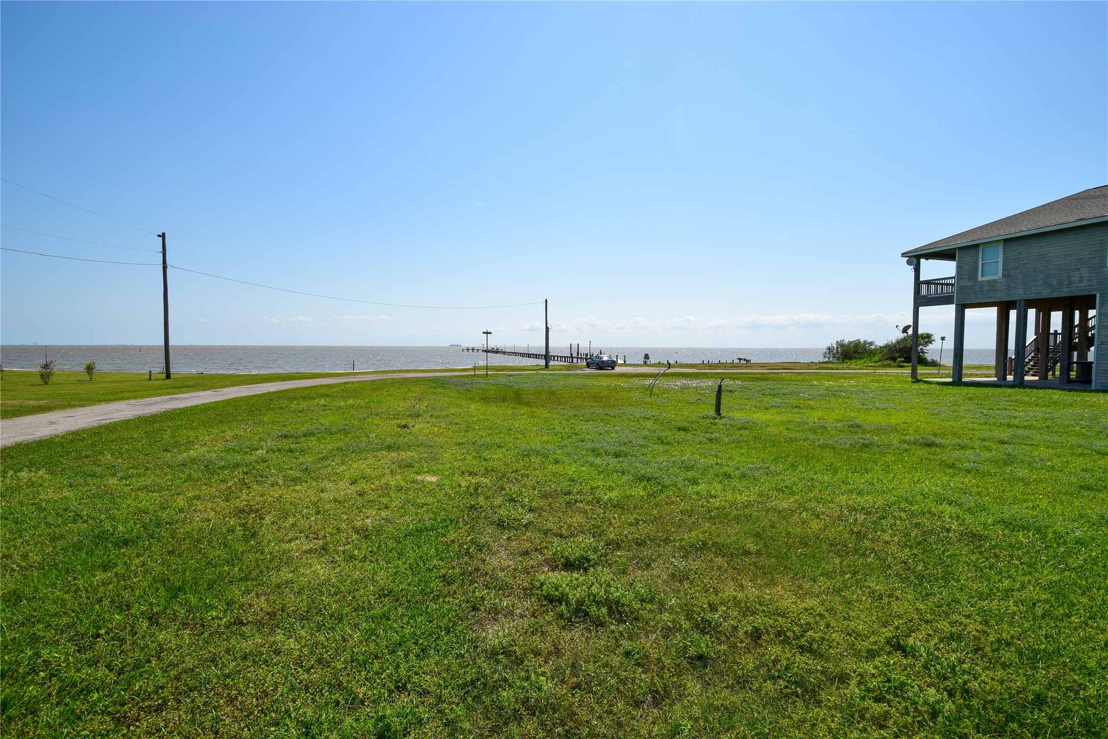 0 James Street Anahuac, TX 77514 - Photo 13 of 35 a backyard of a house with lots of green space