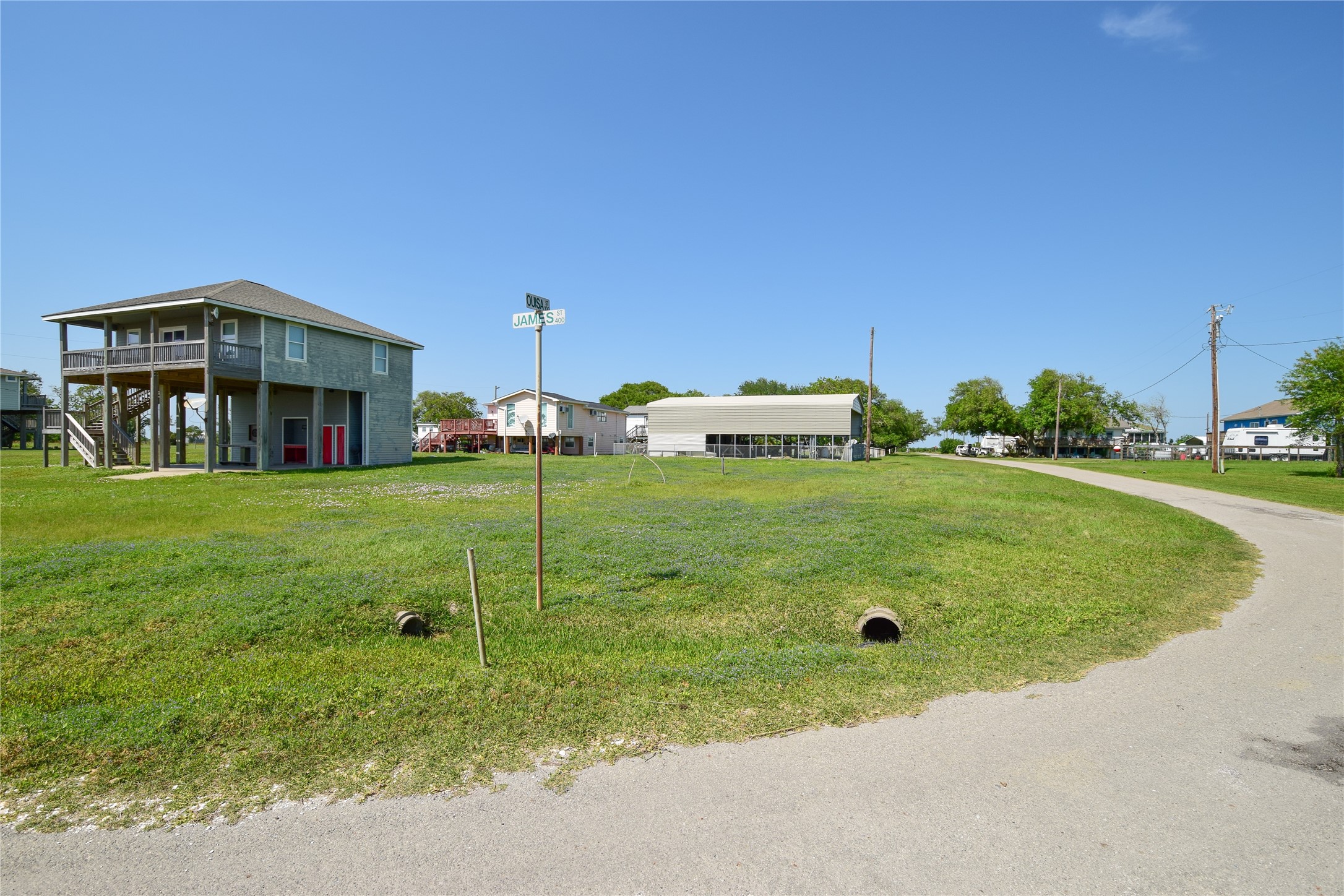 0 James Street Anahuac, TX 77514 - Photo 2 of 35 a view of a house with a yard and sitting area