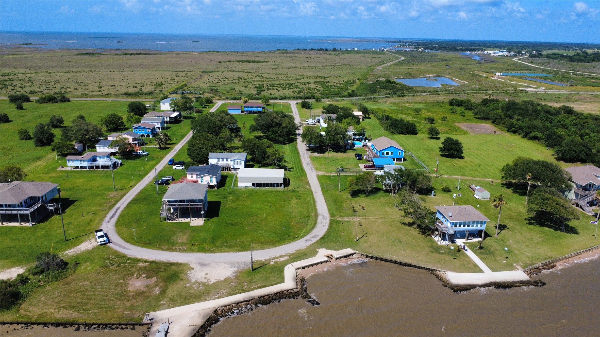 0 James Street Anahuac, TX 77514 - Photo 27 of 35 an aerial view of a house with a swimming pool yard and outdoor seating