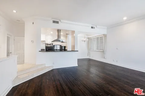 a view of a kitchen with a dishwasher and cabinets