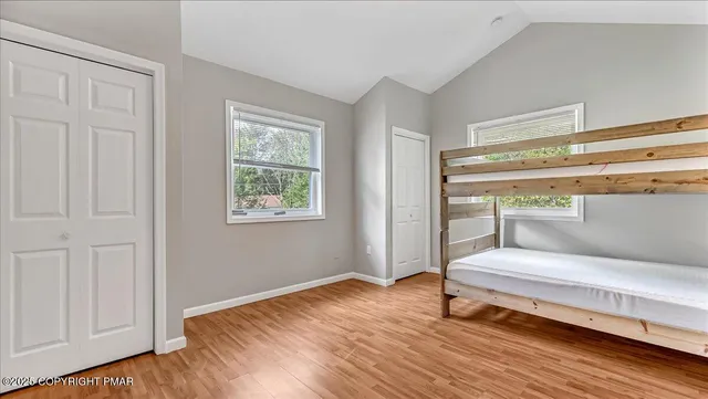 a bathroom with a sink toilet and a mirror