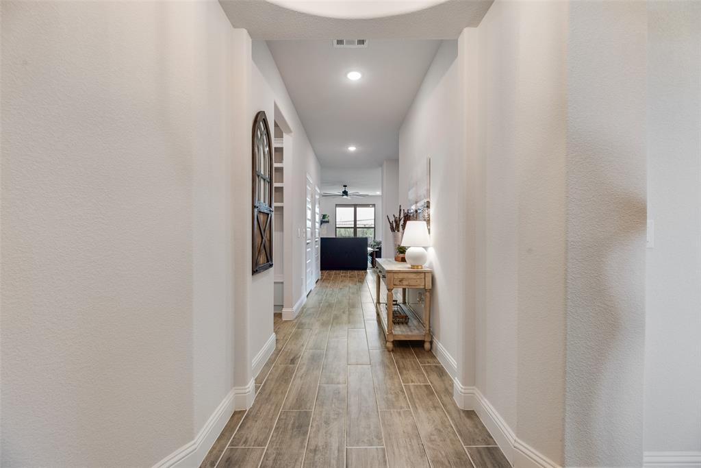 645 Mb Way South Pilot Point, TX 76258 - Photo 6 of 37 entry hallway creates an inviting first impression and leads you straight into the heart of the home.
