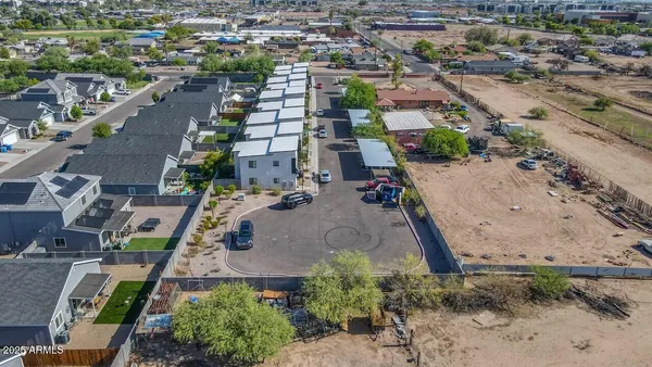 an aerial view of residential house and outdoor space
