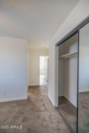 an empty room with closet