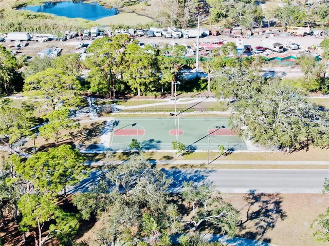 a front view of multi story residential apartment building with yard