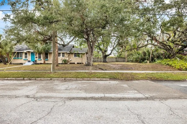 a view of a swimming pool with an outdoor space and seating area