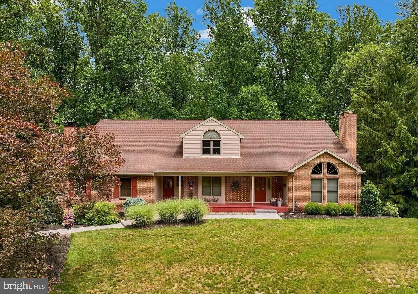 4 Quail Ridge Drive Reading, PA 19607 - Photo 6 of 89 Charming brick home in lush greenery.