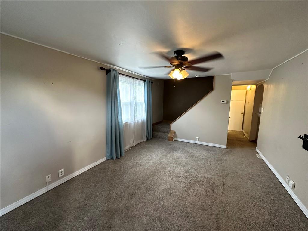 40 2nd Street Lawrence, PA 15055 - Photo 3 of 15 an empty room with windows and fan