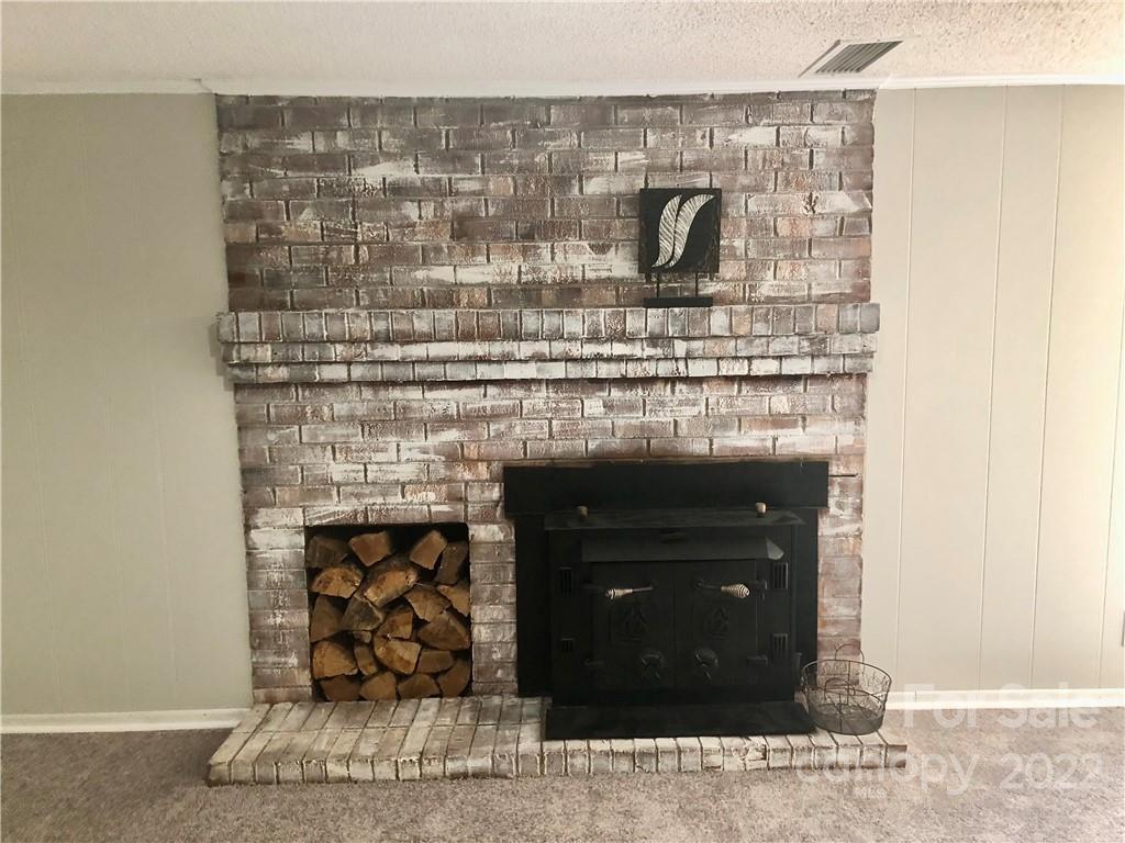 142 Koontz Road Mocksville, NC 27028 - Photo 22 of 47 a close view of a fireplace in a room
