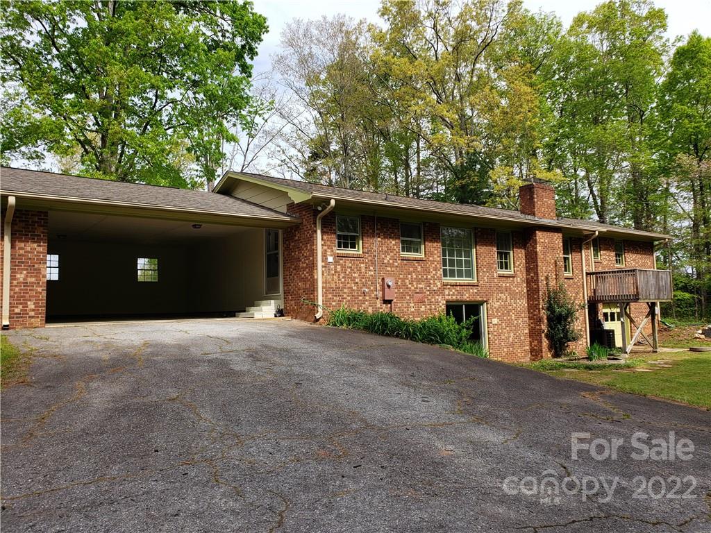 142 Koontz Road Mocksville, NC 27028 - Photo 25 of 47 a front view of a house with a yard