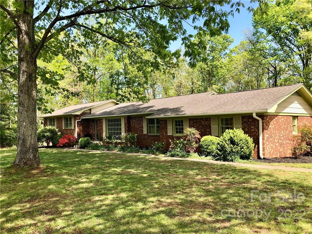 142 Koontz Road Mocksville, NC 27028 - Photo 38 of 47 a front view of a house with garden