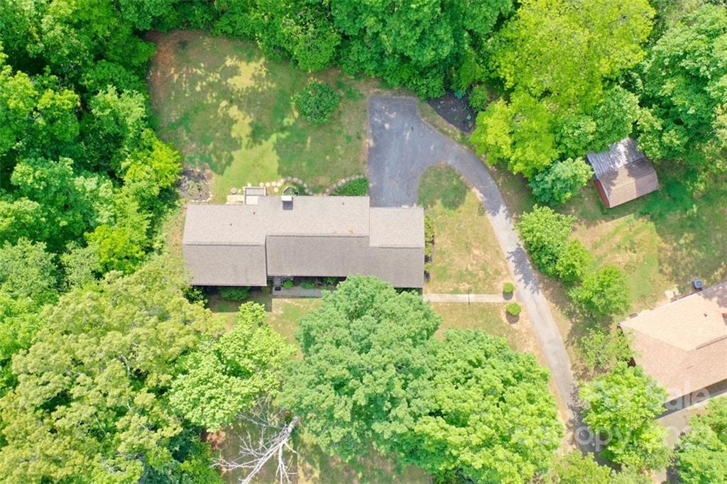 142 Koontz Road Mocksville, NC 27028 - Photo 40 of 47 an aerial view of a house with pool and garden