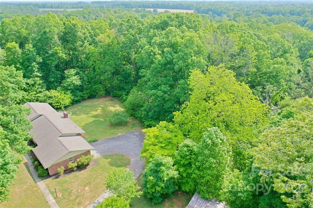 142 Koontz Road Mocksville, NC 27028 - Photo 43 of 47 a view of backyard with outdoor seating