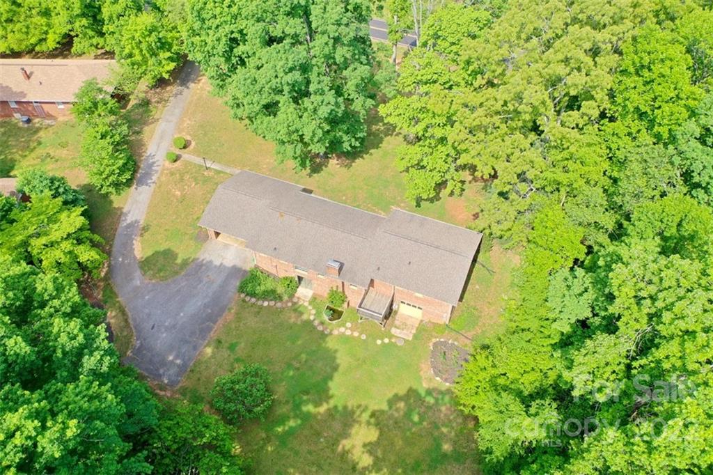 142 Koontz Road Mocksville, NC 27028 - Photo 46 of 47 an aerial view of a residential houses with outdoor space and trees all around