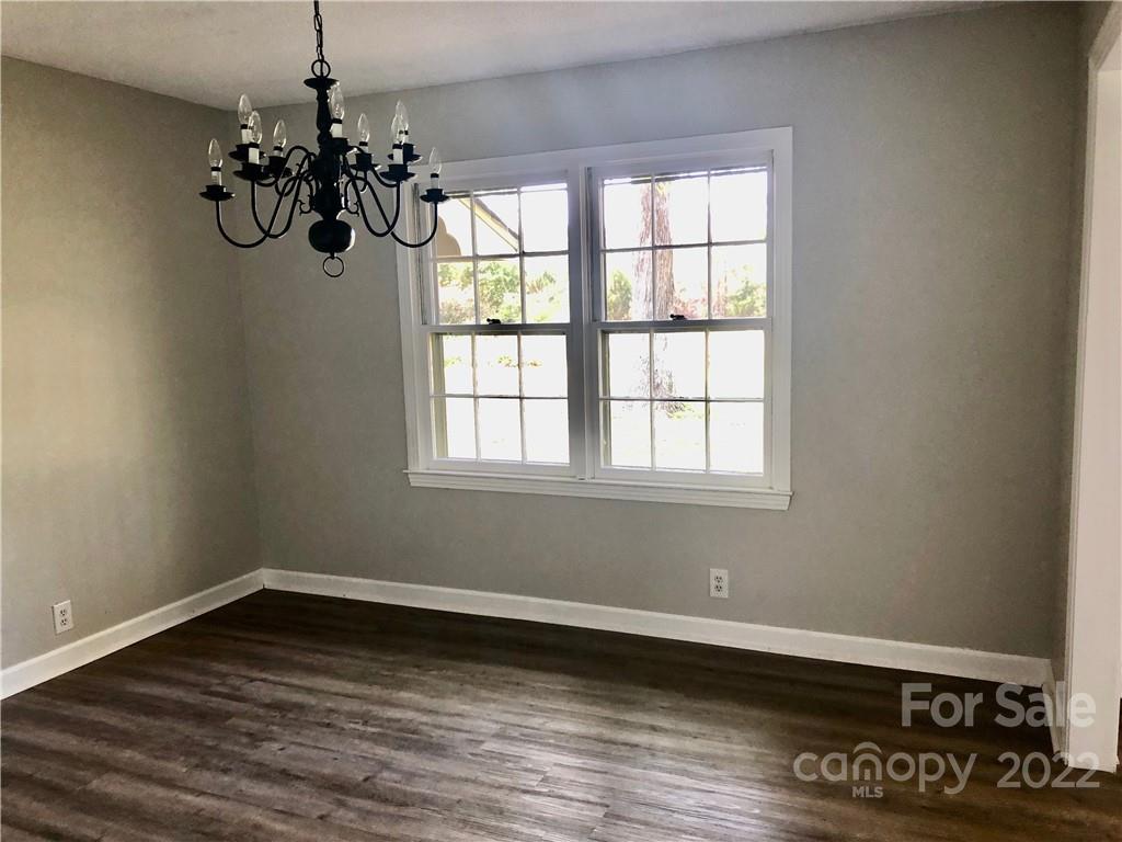 142 Koontz Road Mocksville, NC 27028 - Photo 8 of 47 a view of a room with wooden floor and windows