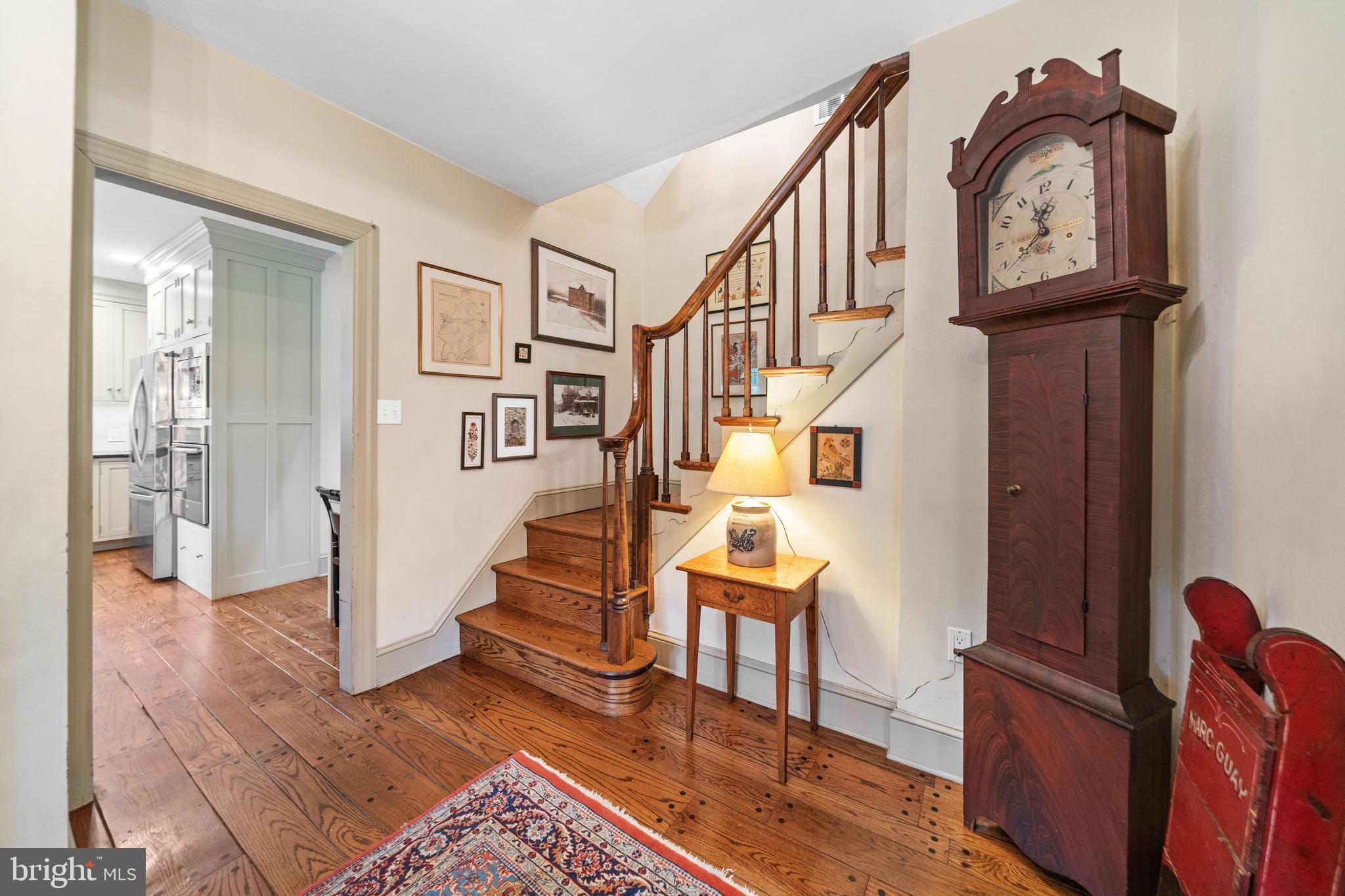 243 Heyburn Road Chadds Ford, PA 19317 - Photo 13 of 58 a view of entryway livingroom and hall with wooden floor