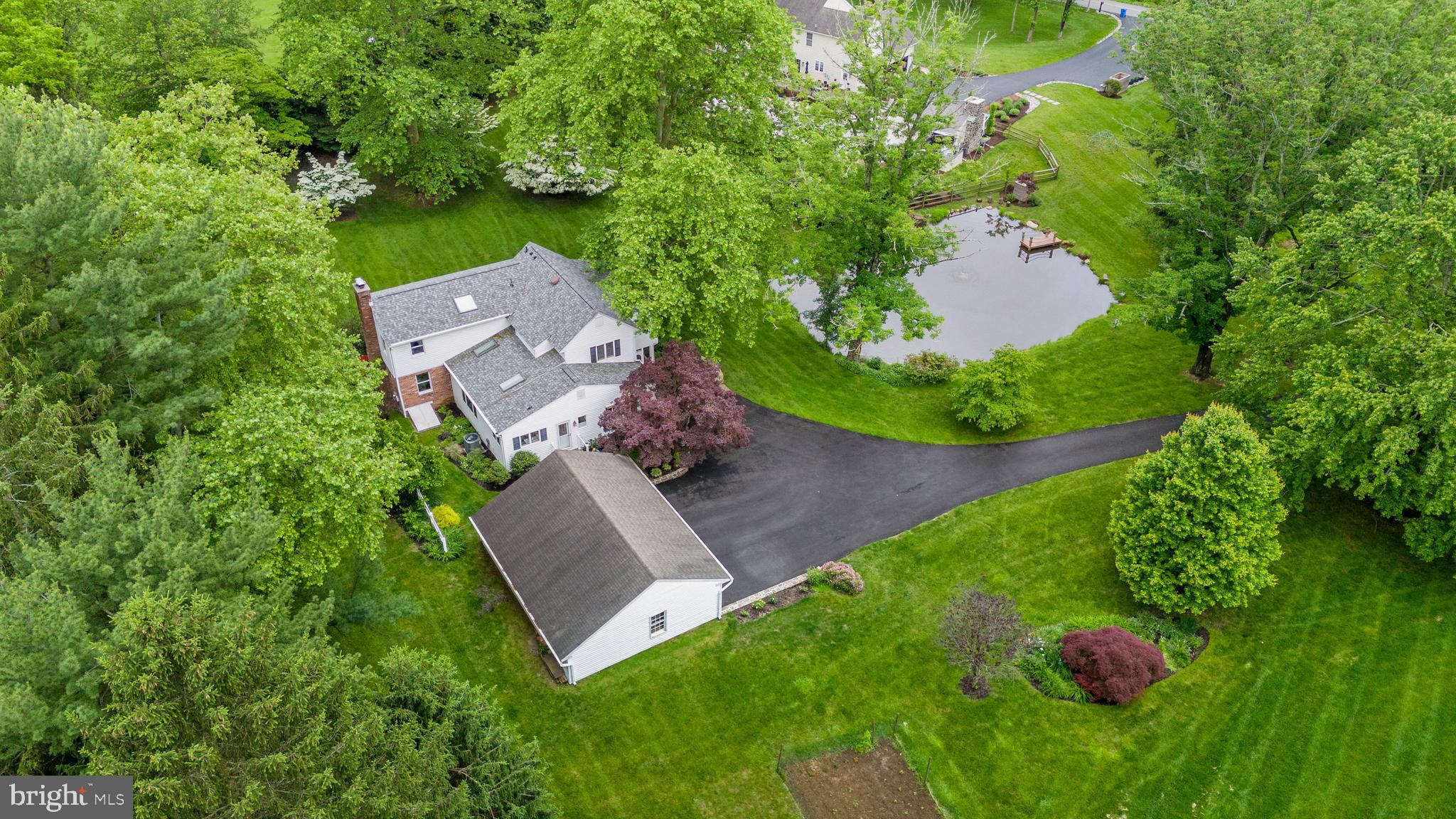 243 Heyburn Road Chadds Ford, PA 19317 - Photo 2 of 58 an aerial view of a house with yard swimming pool and outdoor seating