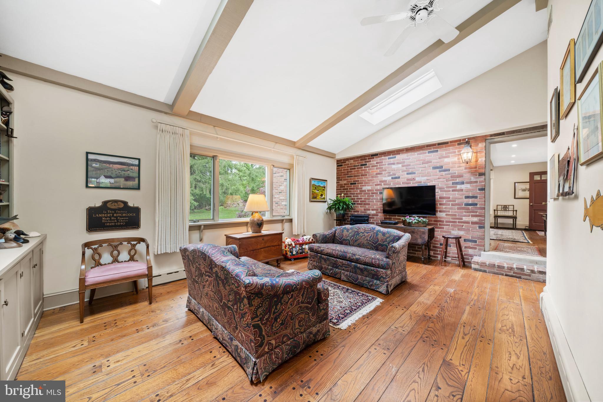 243 Heyburn Road Chadds Ford, PA 19317 - Photo 23 of 58 a living room with furniture and a fireplace
