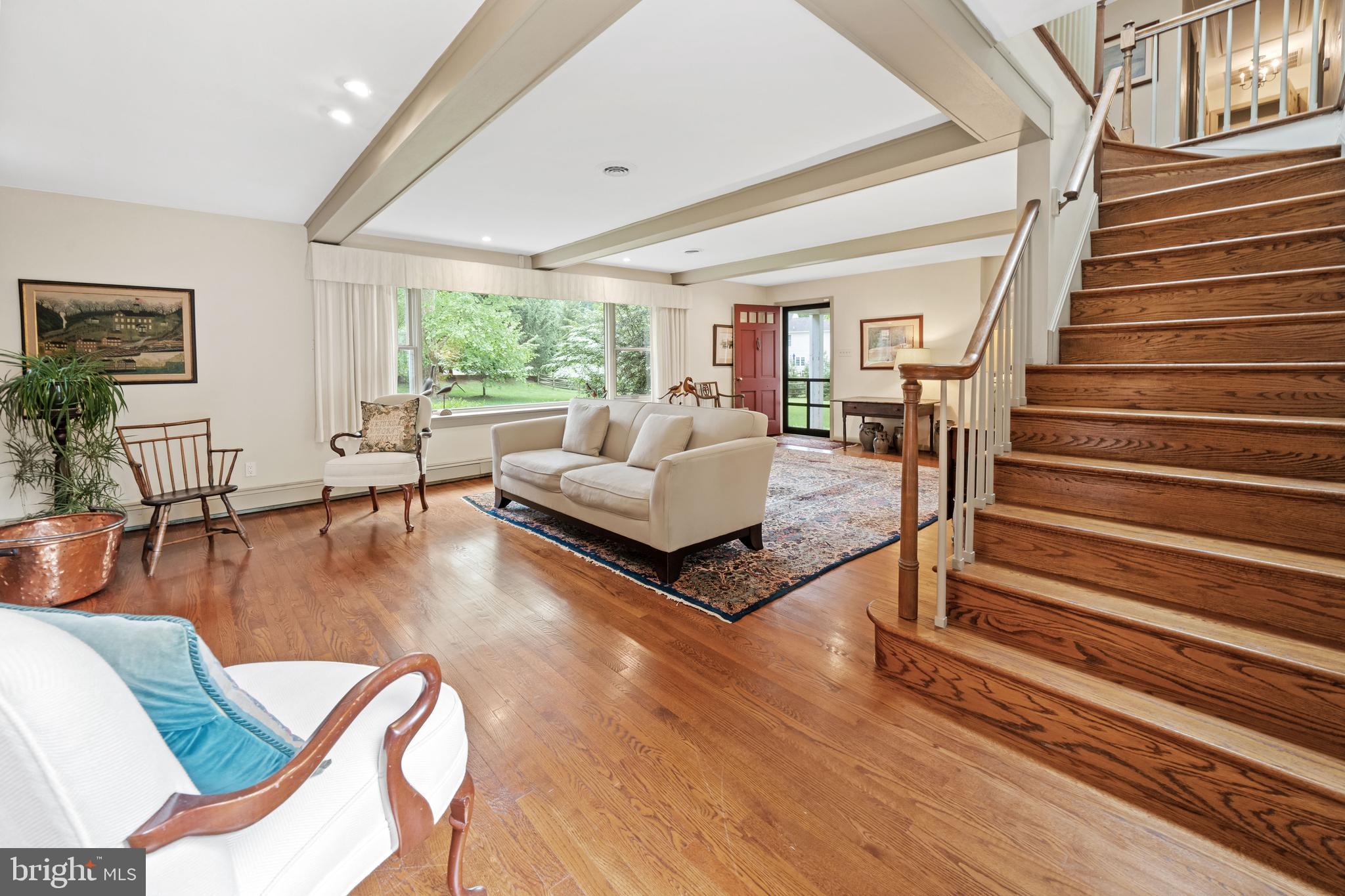 243 Heyburn Road Chadds Ford, PA 19317 - Photo 29 of 58 a living room with furniture and a large window