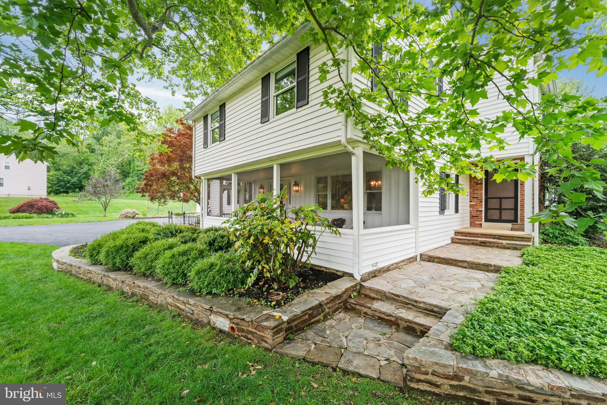 243 Heyburn Road Chadds Ford, PA 19317 - Photo 31 of 58 a front view of a house with a yard