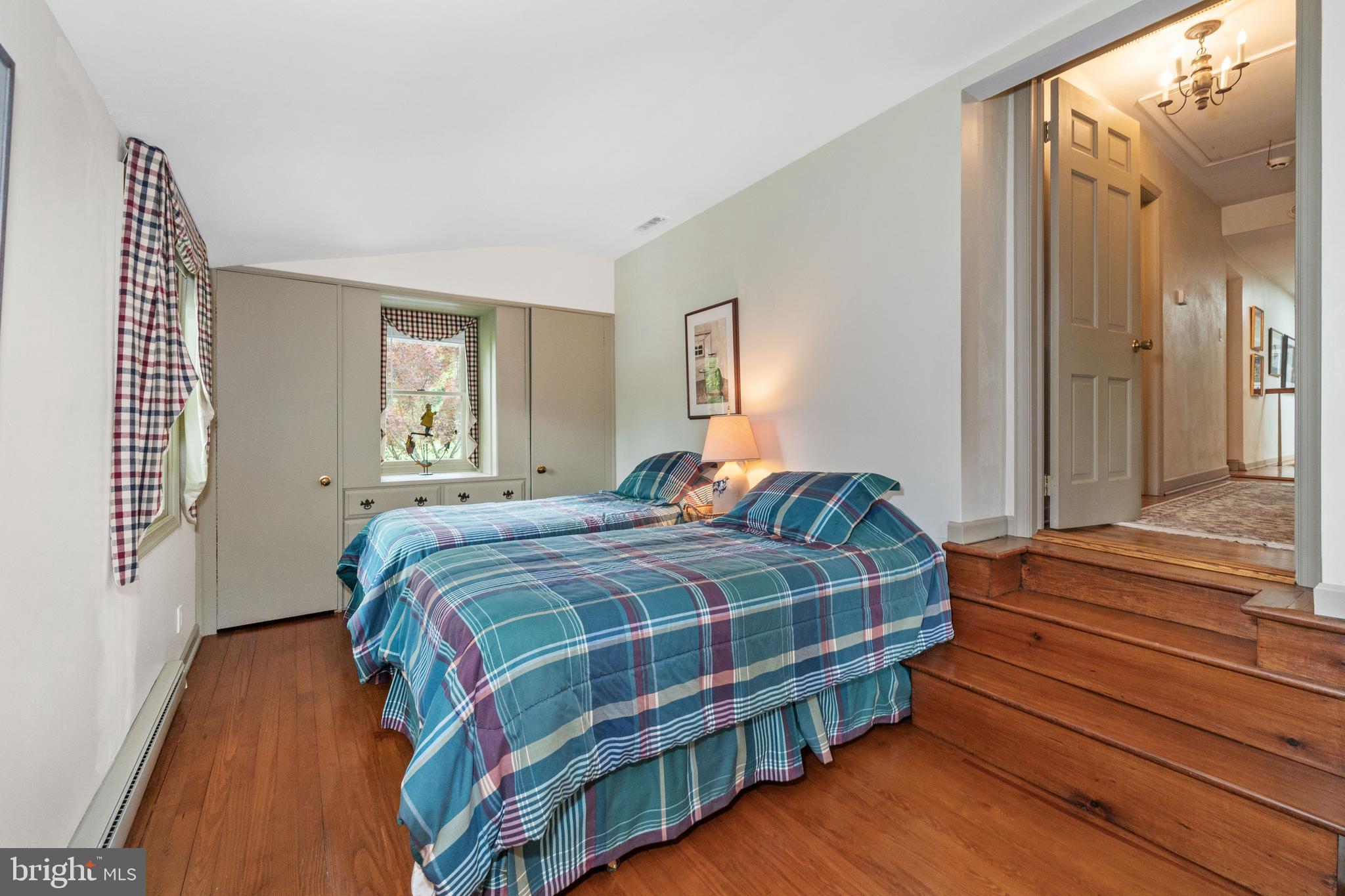 243 Heyburn Road Chadds Ford, PA 19317 - Photo 43 of 58 a bedroom with bed and window