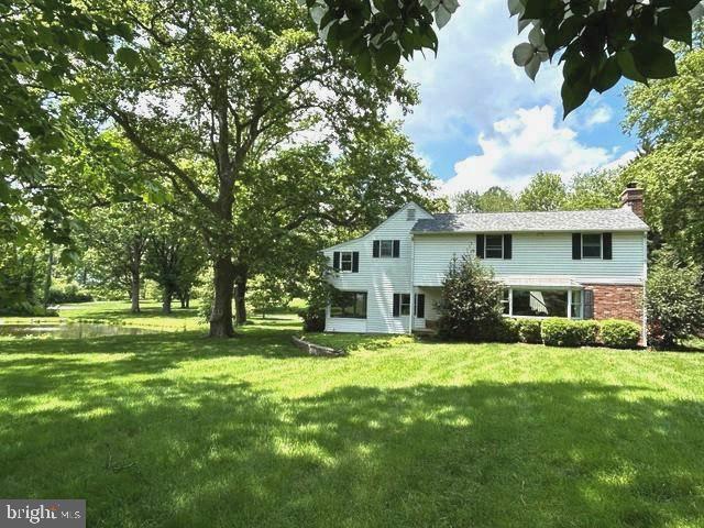 243 Heyburn Road Chadds Ford, PA 19317 - Photo 47 of 58 a front view of house with yard and green space