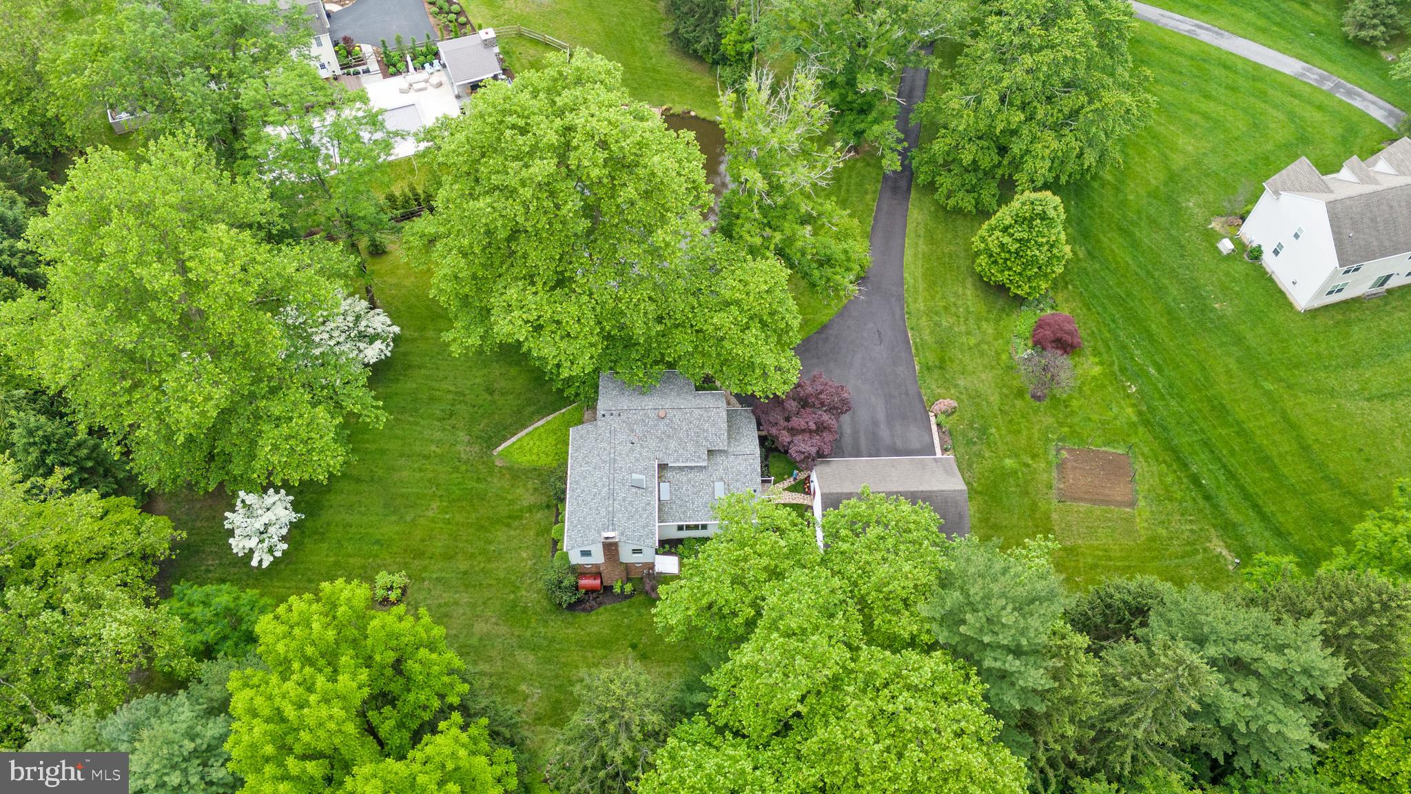 243 Heyburn Road Chadds Ford, PA 19317 - Photo 51 of 58 an aerial view of a house with a yard