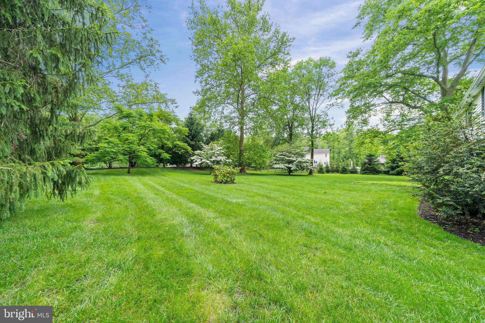 243 Heyburn Road Chadds Ford, PA 19317 - Photo 52 of 58 a view of green field with trees in the background