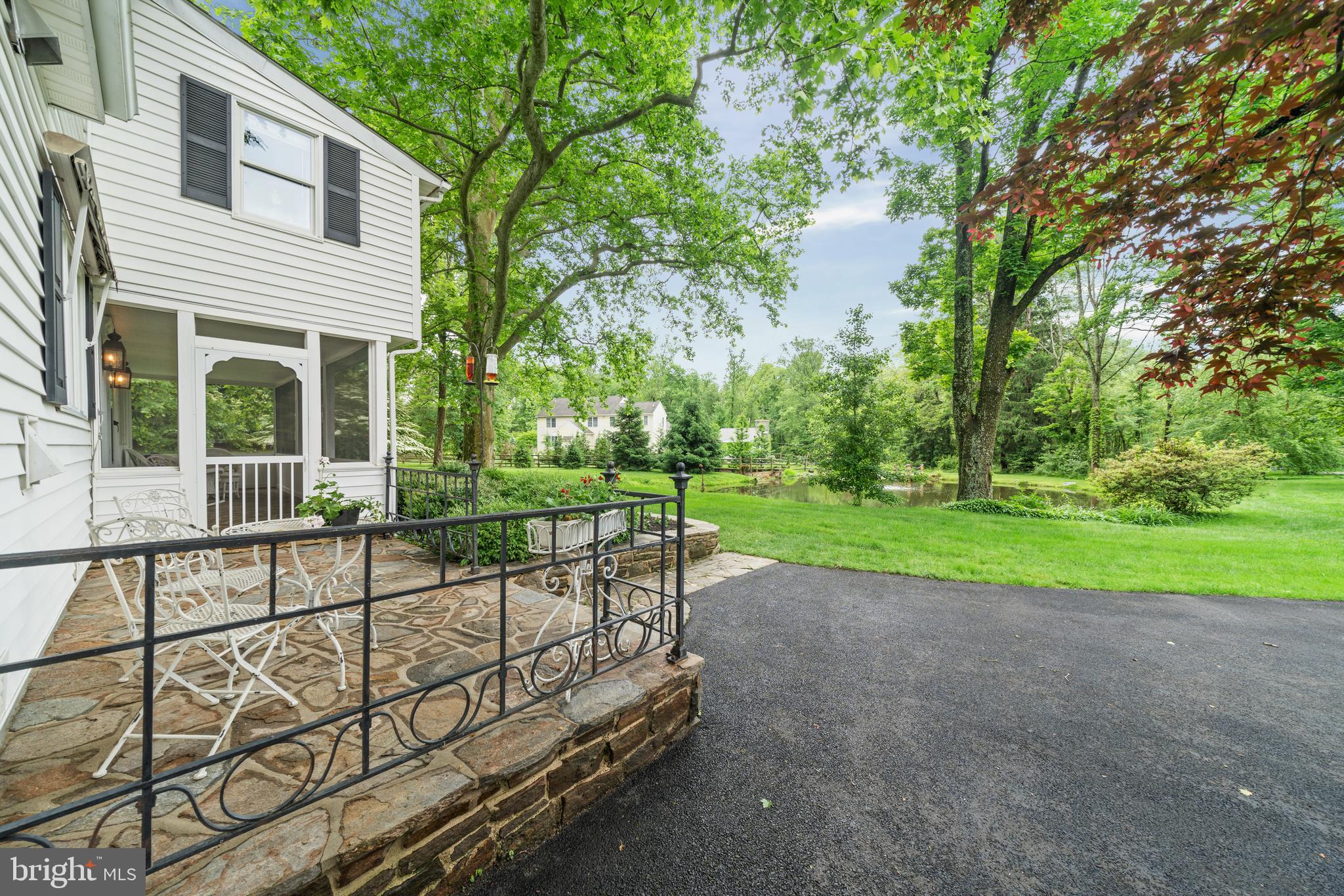 243 Heyburn Road Chadds Ford, PA 19317 - Photo 7 of 58 a view of a house with backyard and sitting area