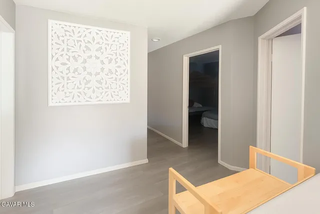 a view of a brick house with an empty space