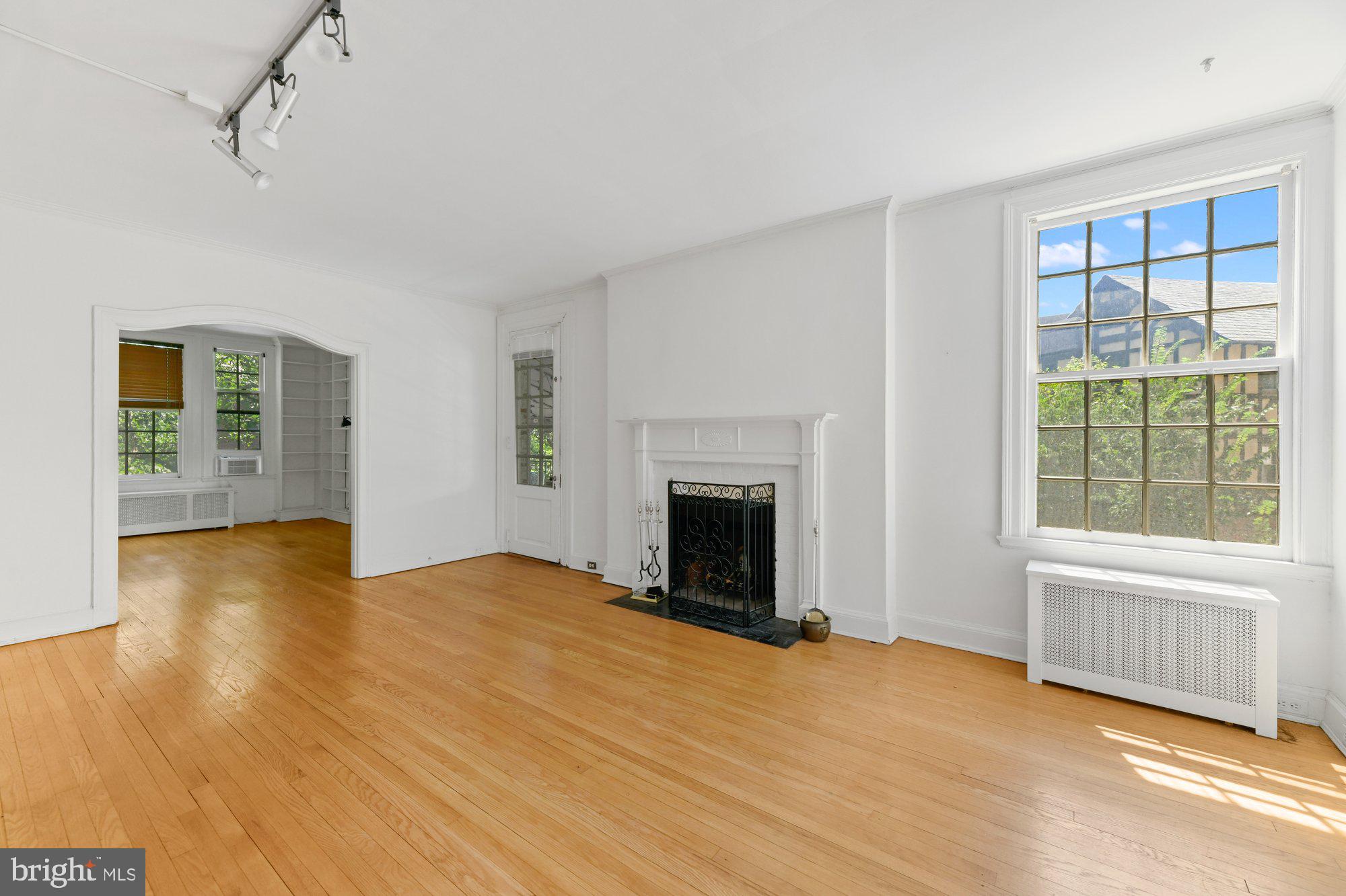 3902 Canterbury Road, Unit 2A Baltimore, MD 21218 - Photo 4 of 30 Living Room With Wood Burning Firplace