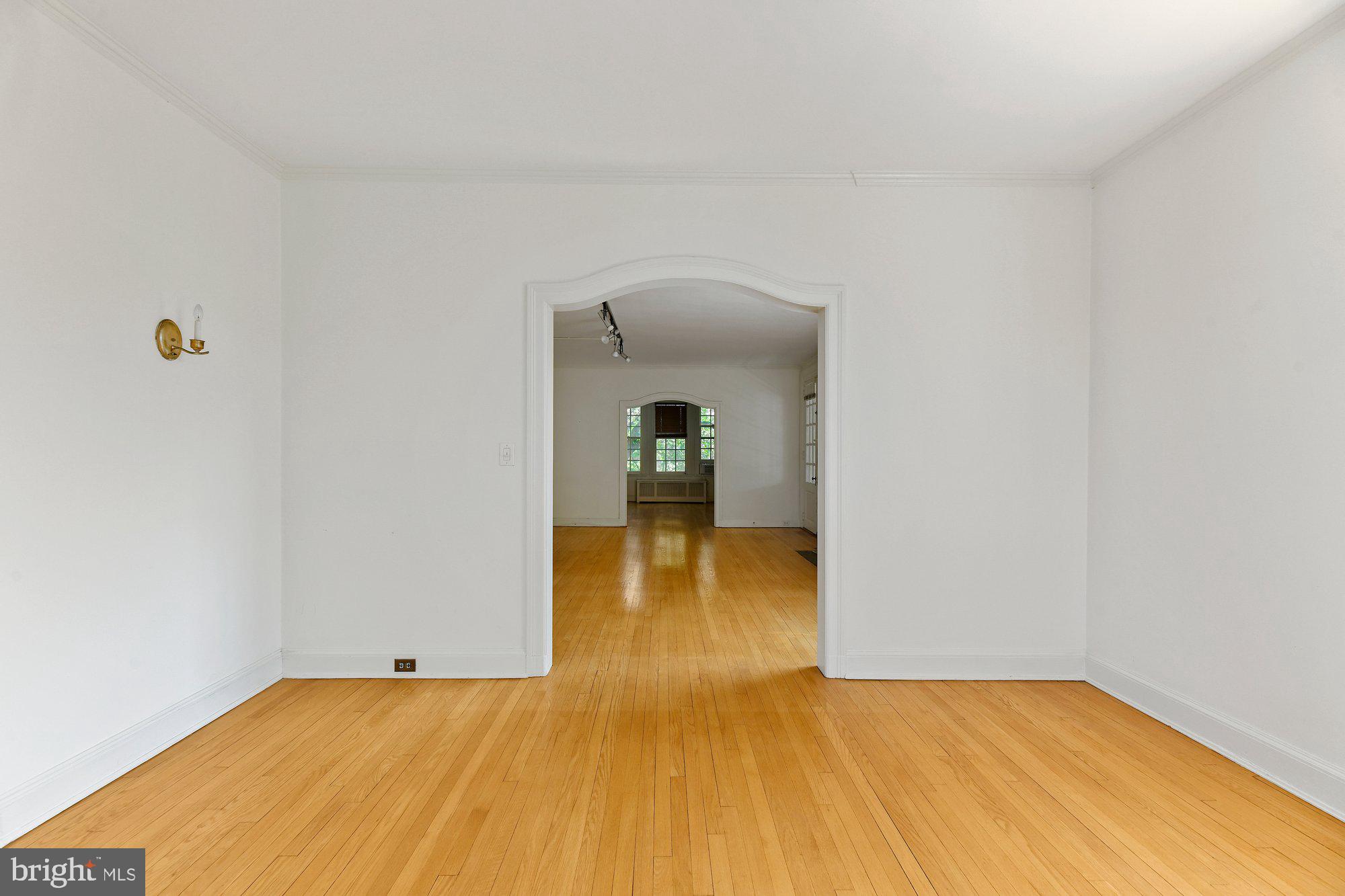 3902 Canterbury Road, Unit 2A Baltimore, MD 21218 - Photo 8 of 30 View From Dining Room Through Living Room and Den