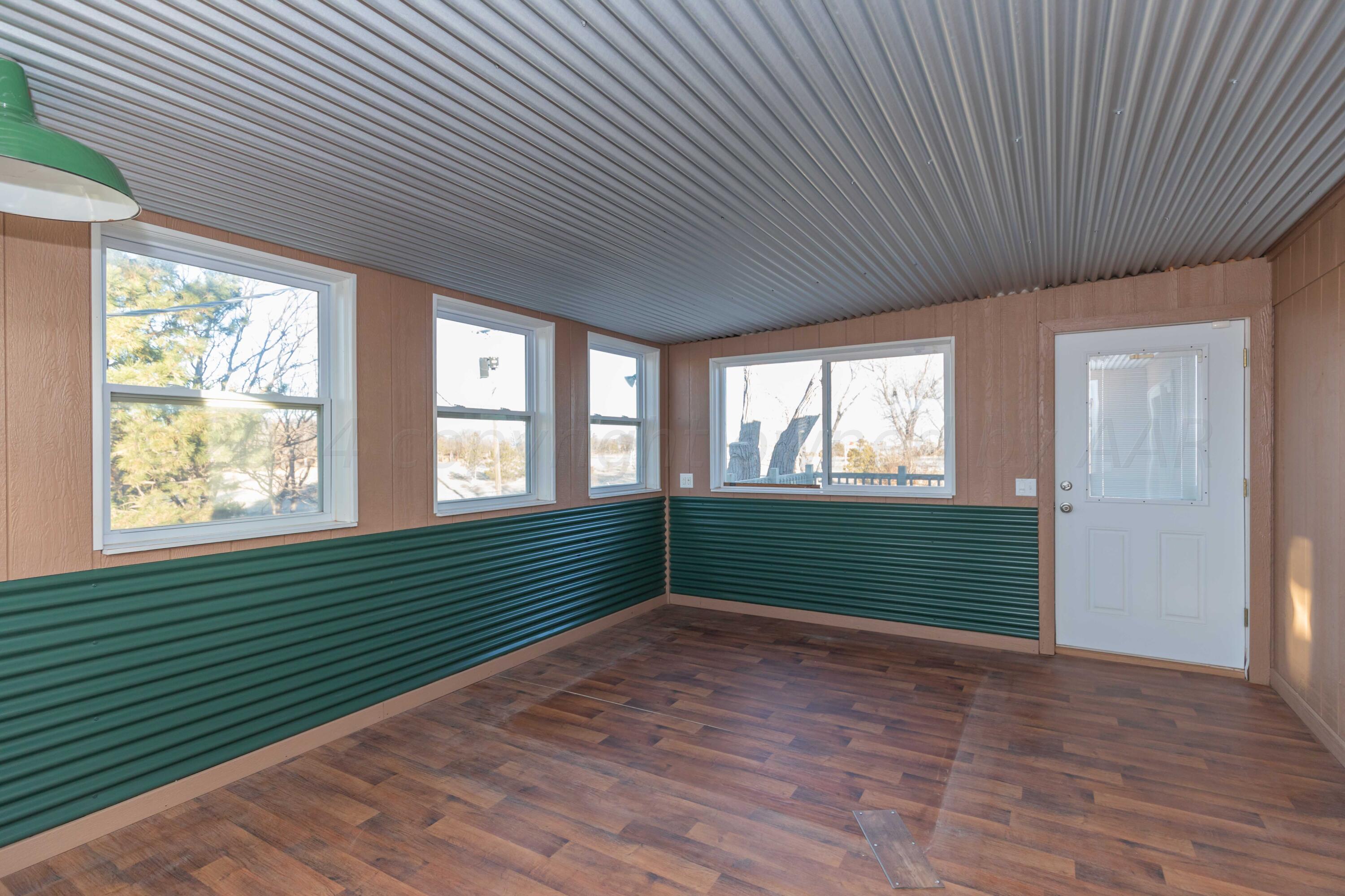 1800 West McCormick Road Amarillo, TX 79118 - Photo 37 of 92 UPSTAIRS SUNROOM VIEW 1