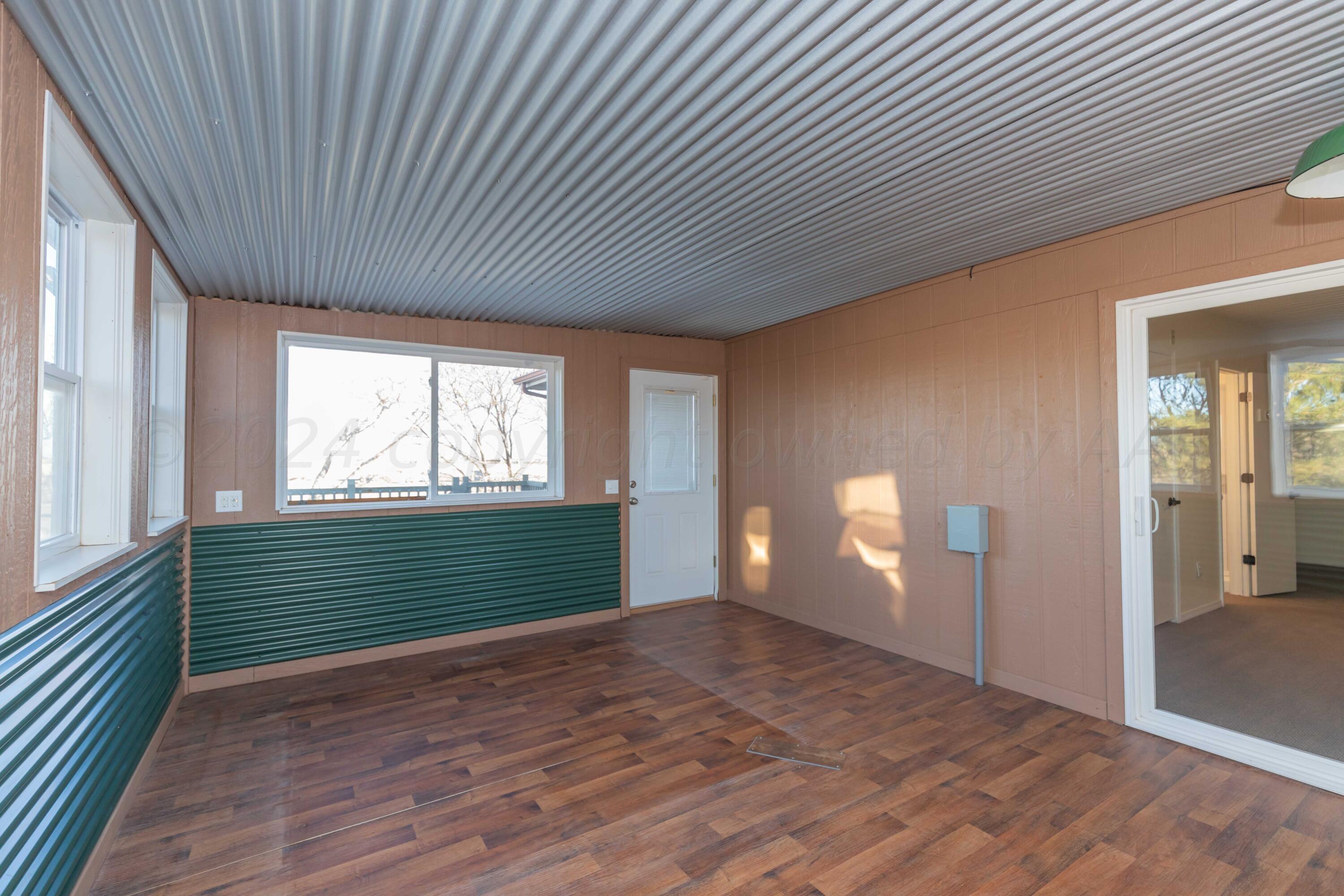 1800 West McCormick Road Amarillo, TX 79118 - Photo 38 of 92 UPSTAIRS SUNROOM VIEW 2