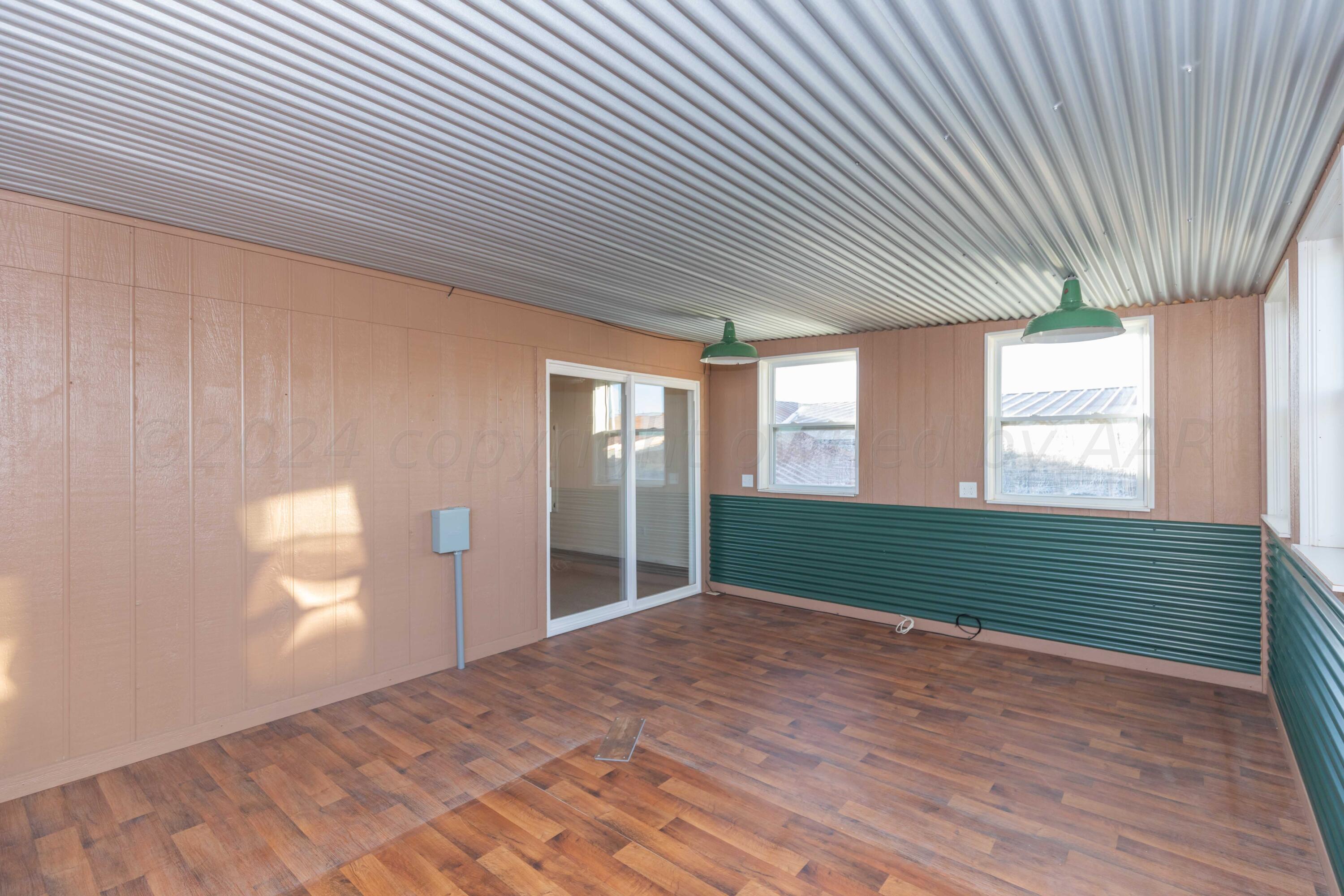 1800 West McCormick Road Amarillo, TX 79118 - Photo 39 of 92 UPSTAIRS SUNROOM VIEW 3