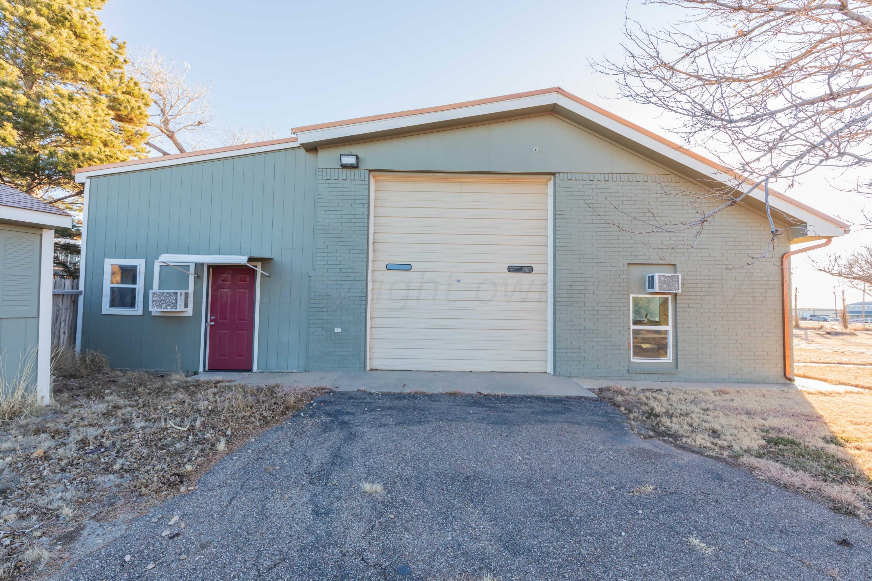 1800 West McCormick Road Amarillo, TX 79118 - Photo 66 of 92 SHOP RV GARAGE DOOR 1