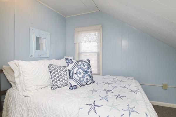 21 Grove Street-onset Wareham Ma Onset, MA 02558 - Photo 11 of 15 a bedroom with a large bed and a window