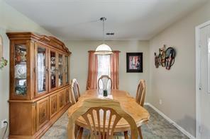 1300 Clegg Street Howe, TX 75459 - Photo 4 of 14 Dining area with a pendant light fixture, window with drapes, and light-toned flooring