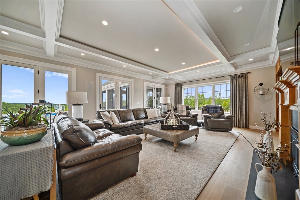 17 Chestnut Lane Littleton, MA 01460 - Photo 12 of 40 a living room with furniture potted plant and a window