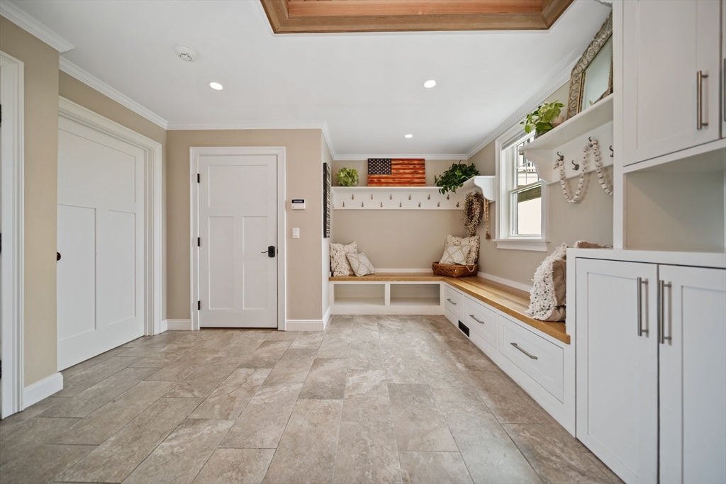17 Chestnut Lane Littleton, MA 01460 - Photo 17 of 40 a view of an entryway with kitchen and windows