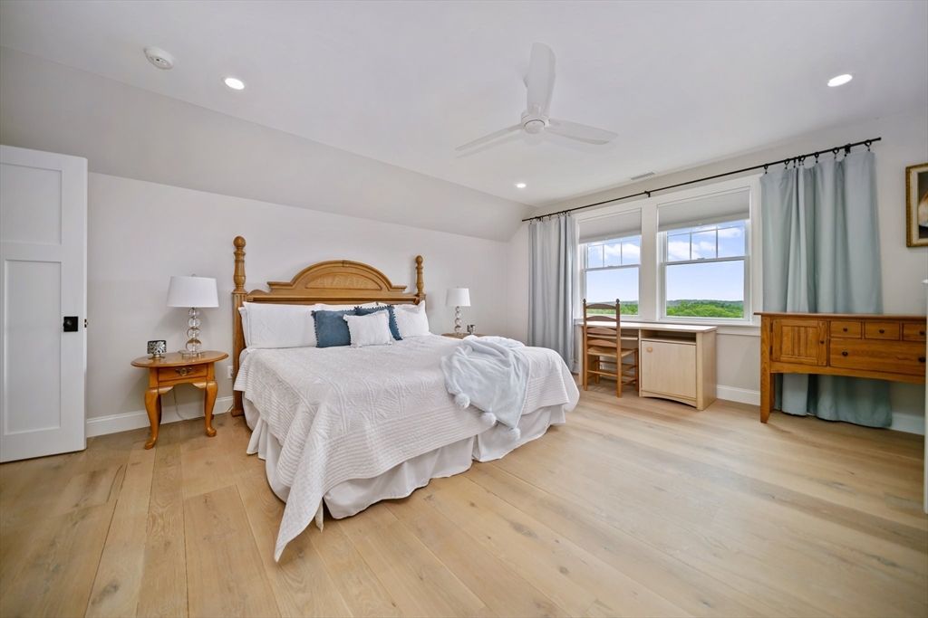 17 Chestnut Lane Littleton, MA 01460 - Photo 23 of 40 a bedroom with a bed and window