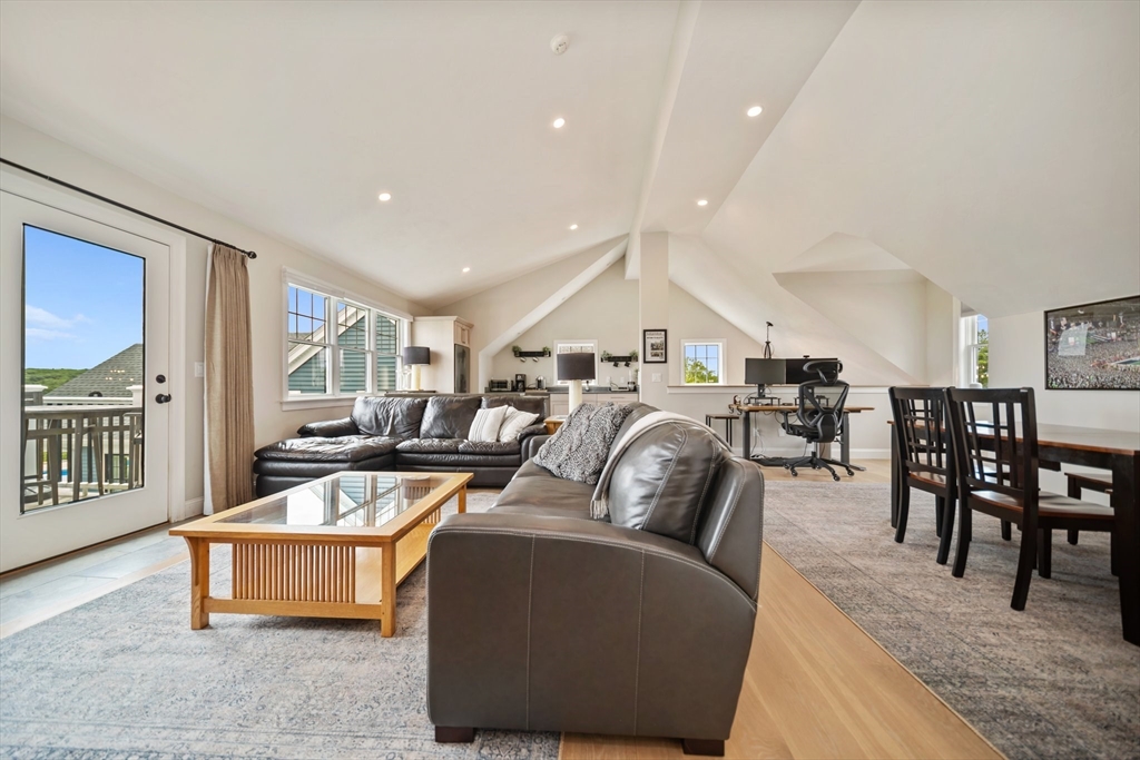 17 Chestnut Lane Littleton, MA 01460 - Photo 27 of 40 a living room with furniture kitchen view and a large window