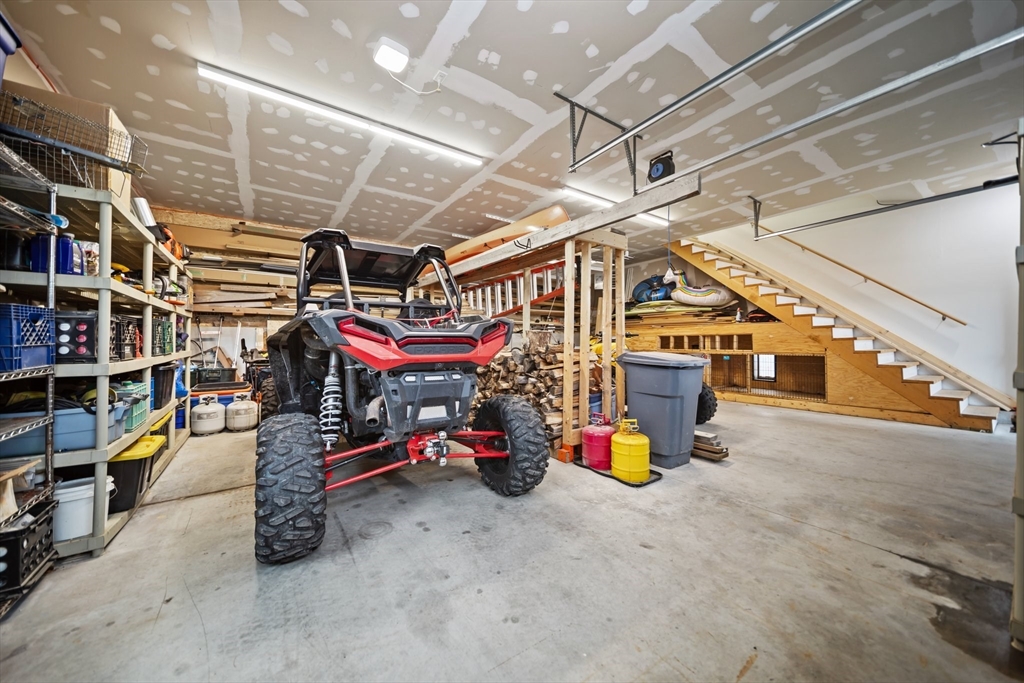17 Chestnut Lane Littleton, MA 01460 - Photo 34 of 40 a view of a garage with a garage